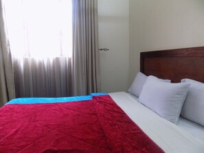 Family Room, Non Smoking | Desk, free WiFi, bed sheets - Riviera Hotel Hoima (Hoima)