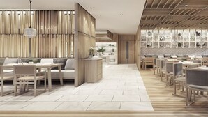 A modern restaurant with wooden furniture and a tiled floor. - Alix Bangkok Hotel (Bangkok)