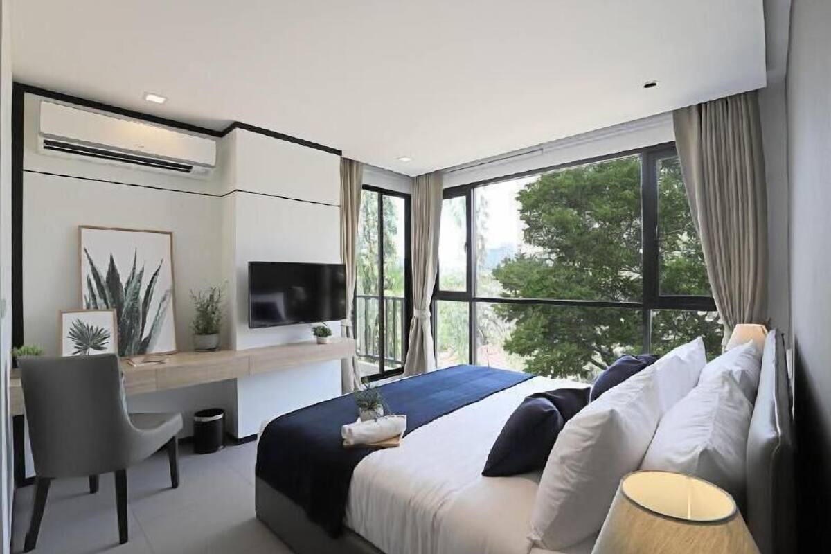 Free minibar items, blackout drapes, soundproofing, iron/ironing board