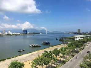 In-room safe, desk, laptop workspace, blackout drapes - Vitalis Riverside Hotel (Da Nang)
