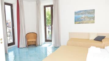 Deluxe Triple Room | 1 bedroom, minibar, in-room safe, desk