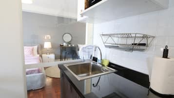 2-Bedroom Suite | Private kitchen | Fridge, stovetop, coffee/tea maker, electric kettle