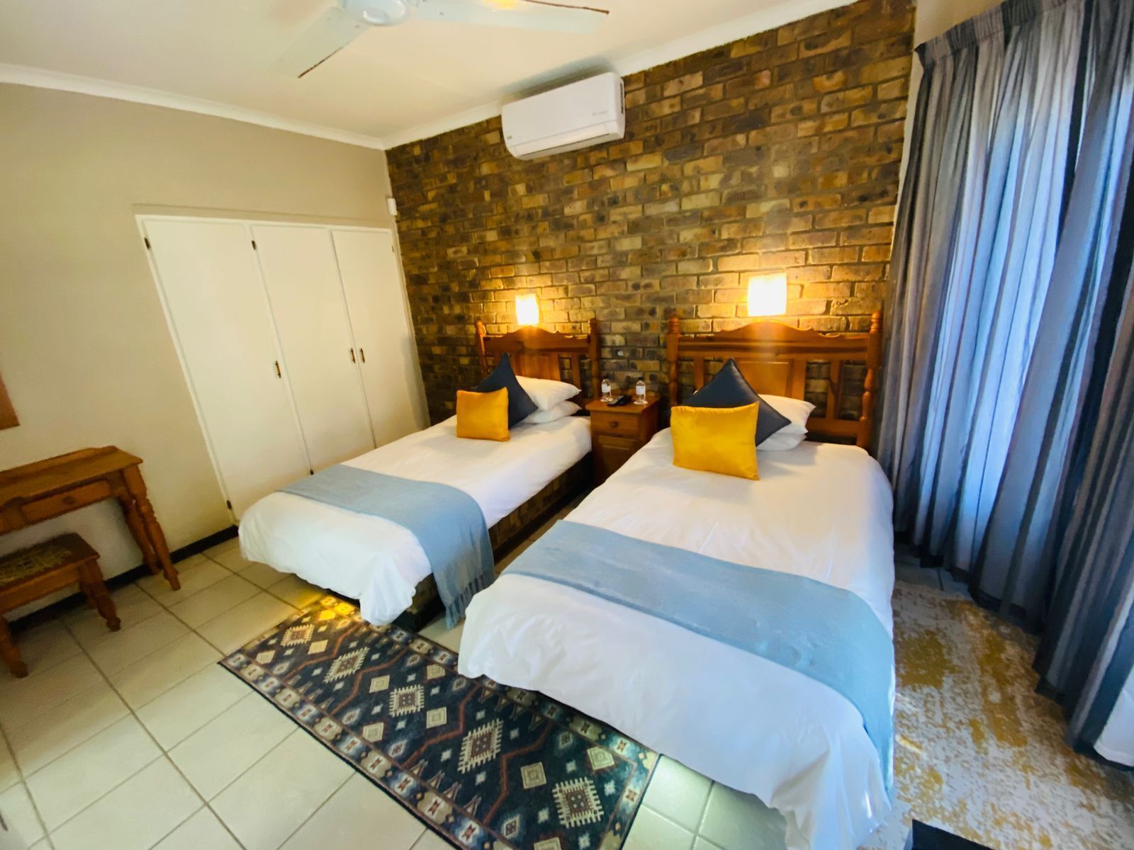 Standard Twin Room, Multiple Beds | In-room safe, individually decorated, individually furnished