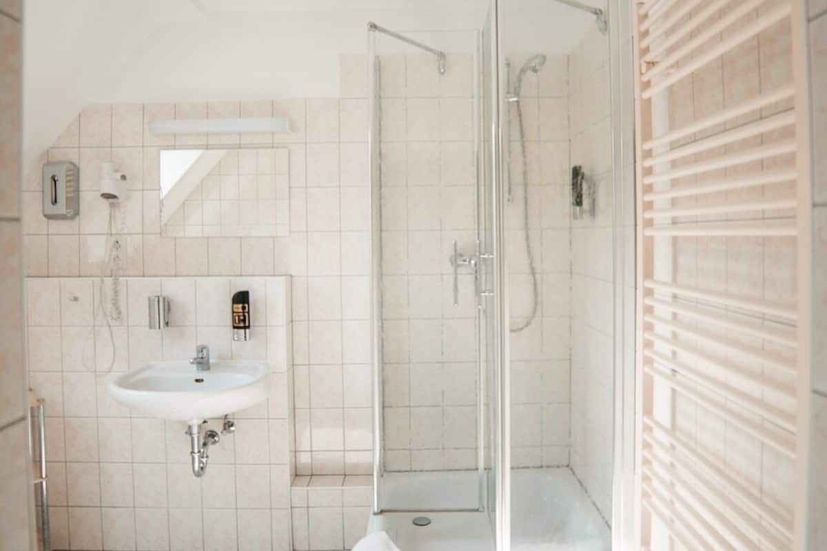triple room | bathroom | shower, hair dryer, towels, soap