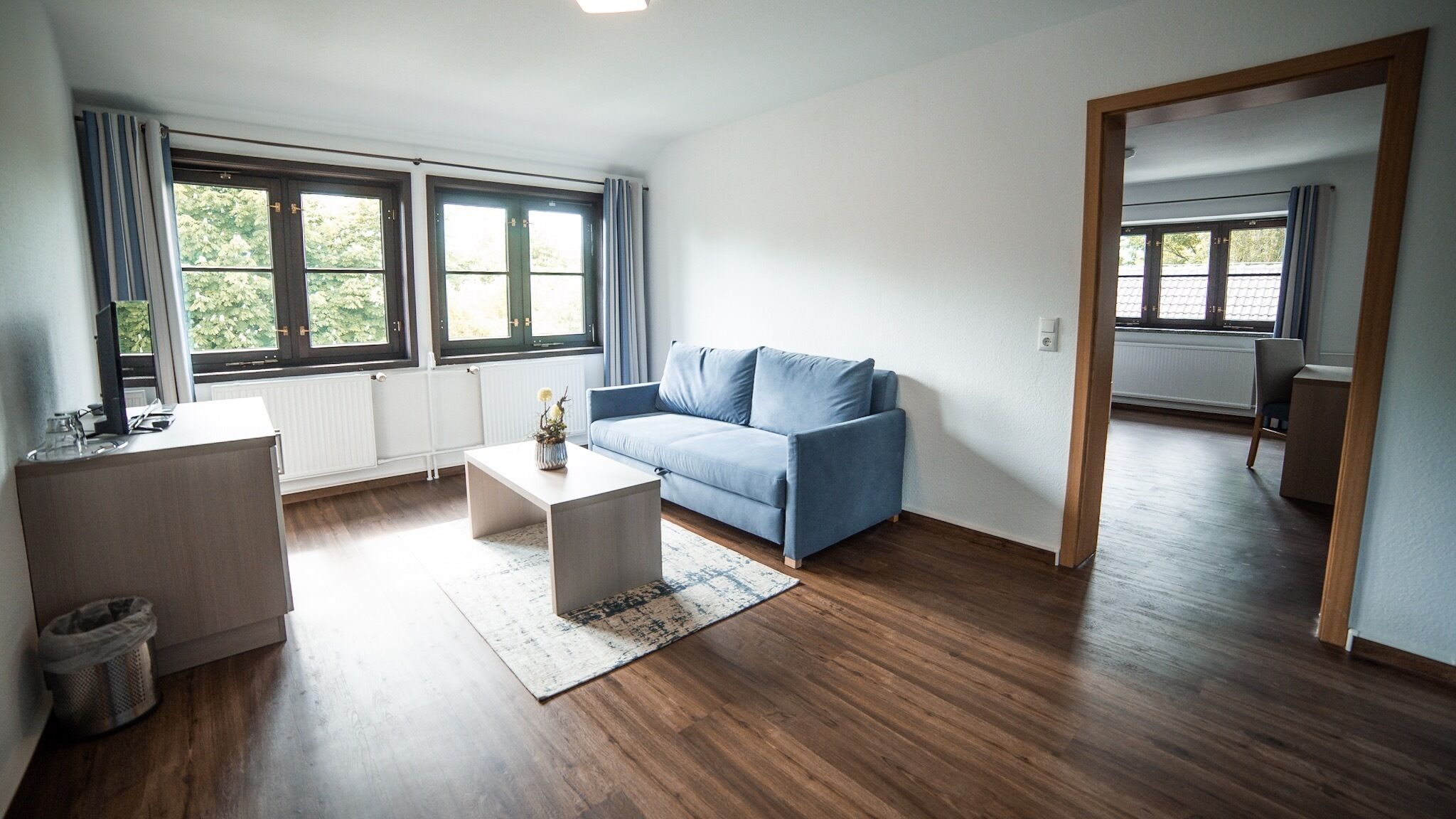 comfort plus double room | living area | flat-screen tv