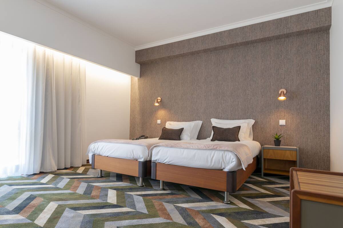 Iron/ironing board (on request), WiFi (free), bed sheets