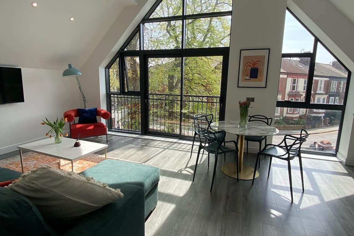 luxury condo | living area | 55-inch flat-screen tv with cable channels