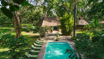 Outdoor pool, open 8:00 AM to 6:00 PM, pool loungers