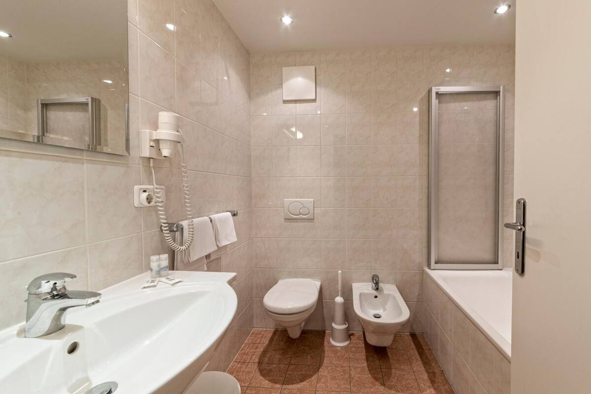 free toiletries, hair dryer, bidet, towels