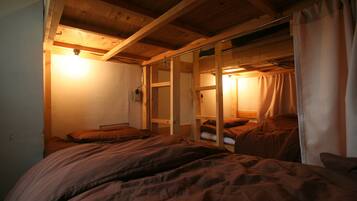 Family Condo, 1 Bedroom, Smoking, Kitchenette | 1 bedroom, laptop workspace, free WiFi, bed sheets