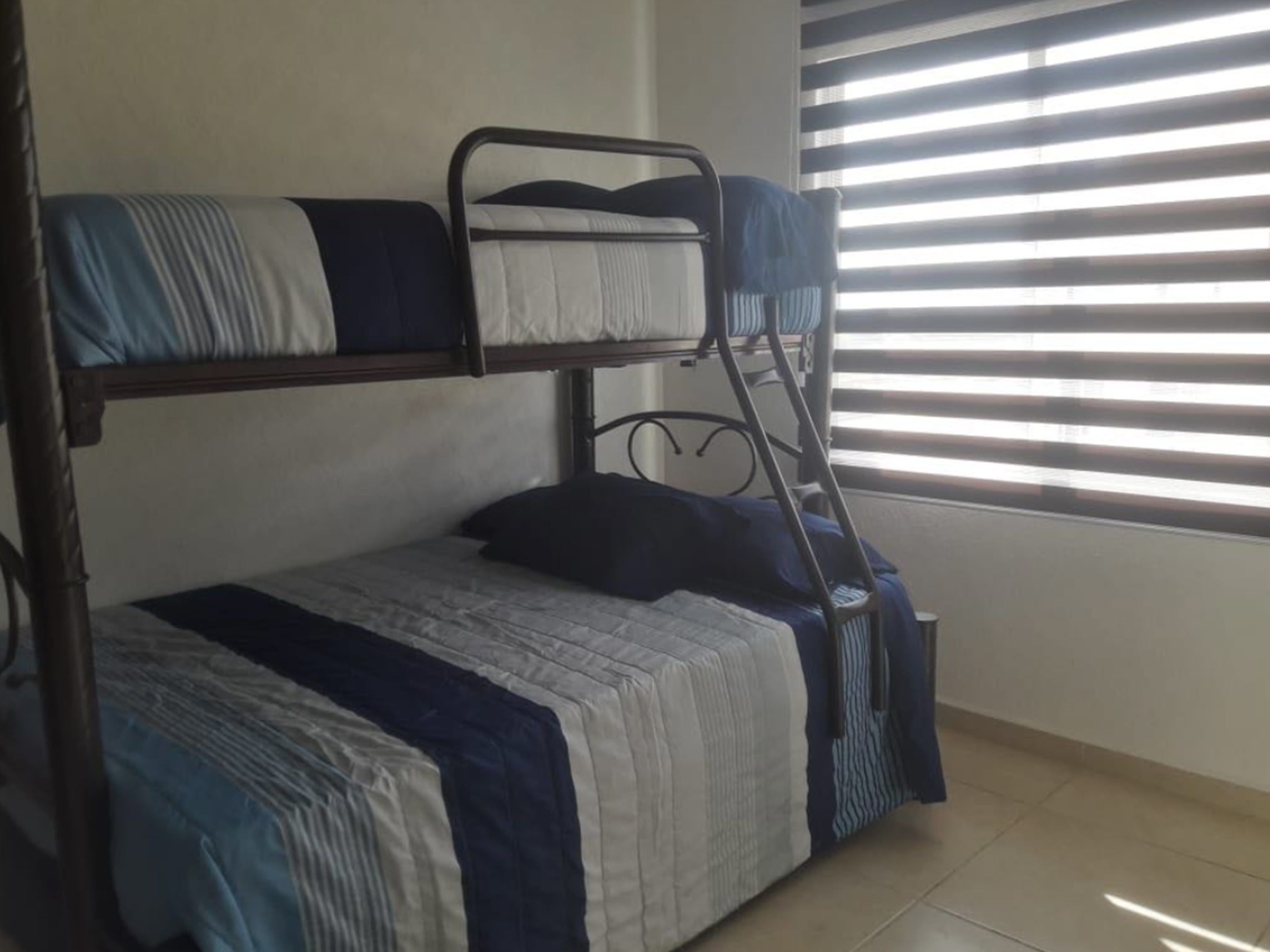 traditional penthouse, 2 bedrooms, kitchen, lagoon view | premium bedding, desk, iron/ironing board, bed sheets