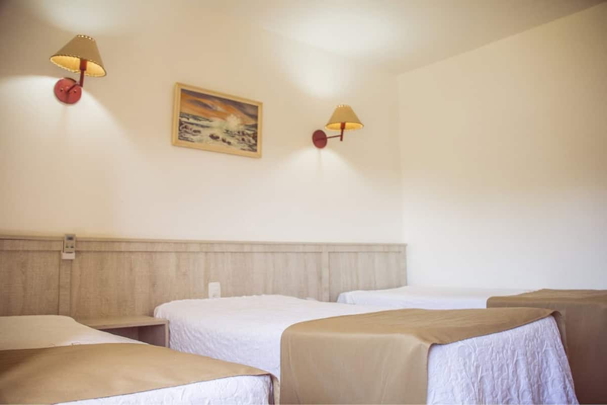 deluxe room | minibar, in-room safe, desk, blackout curtains