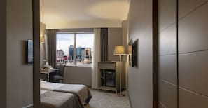 Superior Room (Citylife) | Minibar, in-room safe, desk, blackout drapes