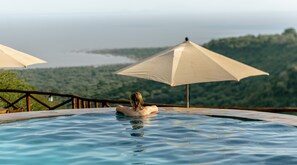 Outdoor pool, pool umbrellas, pool loungers