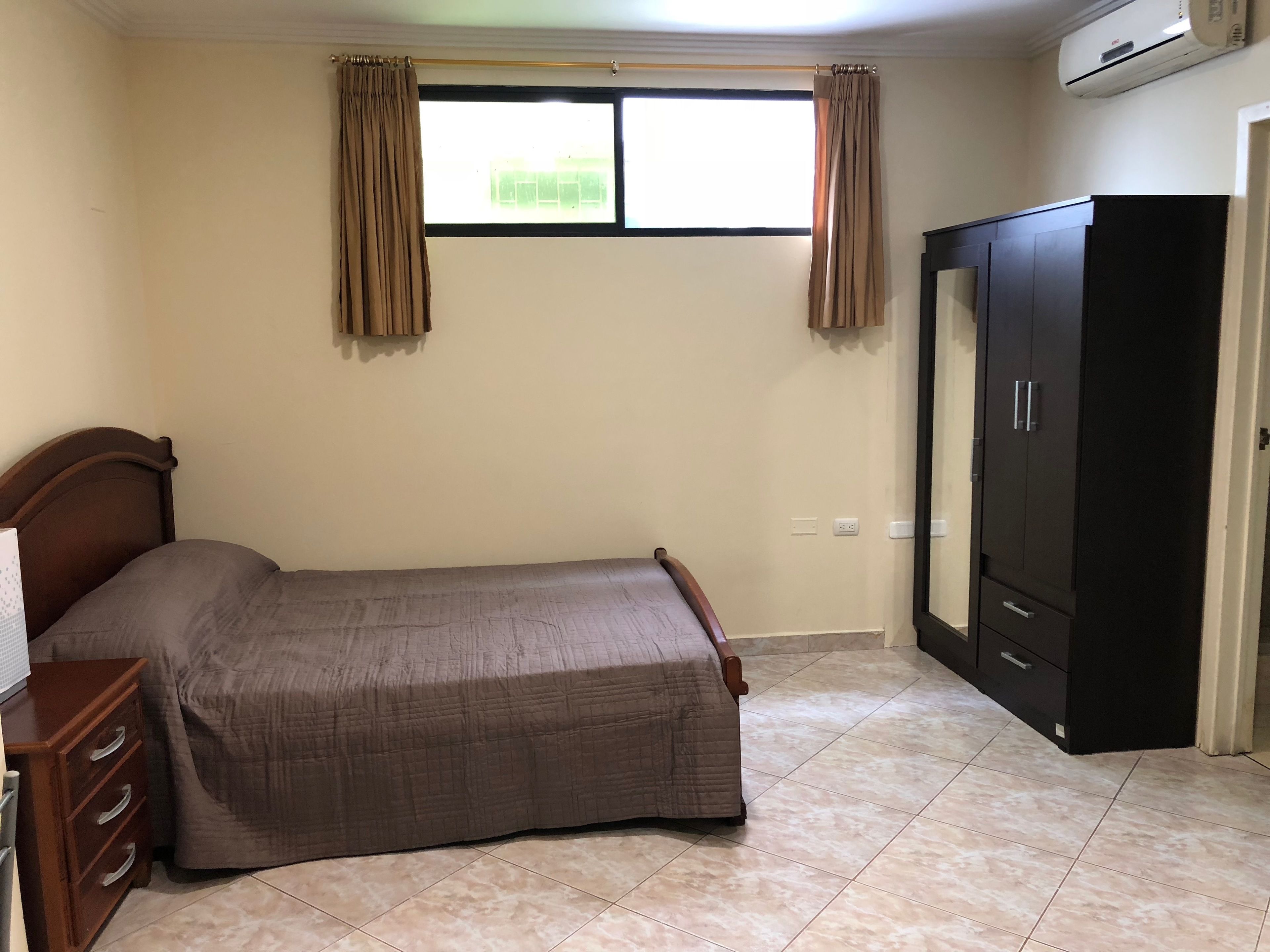 standard suite, non smoking, city view | in-room safe, desk, rollaway beds, free wifi