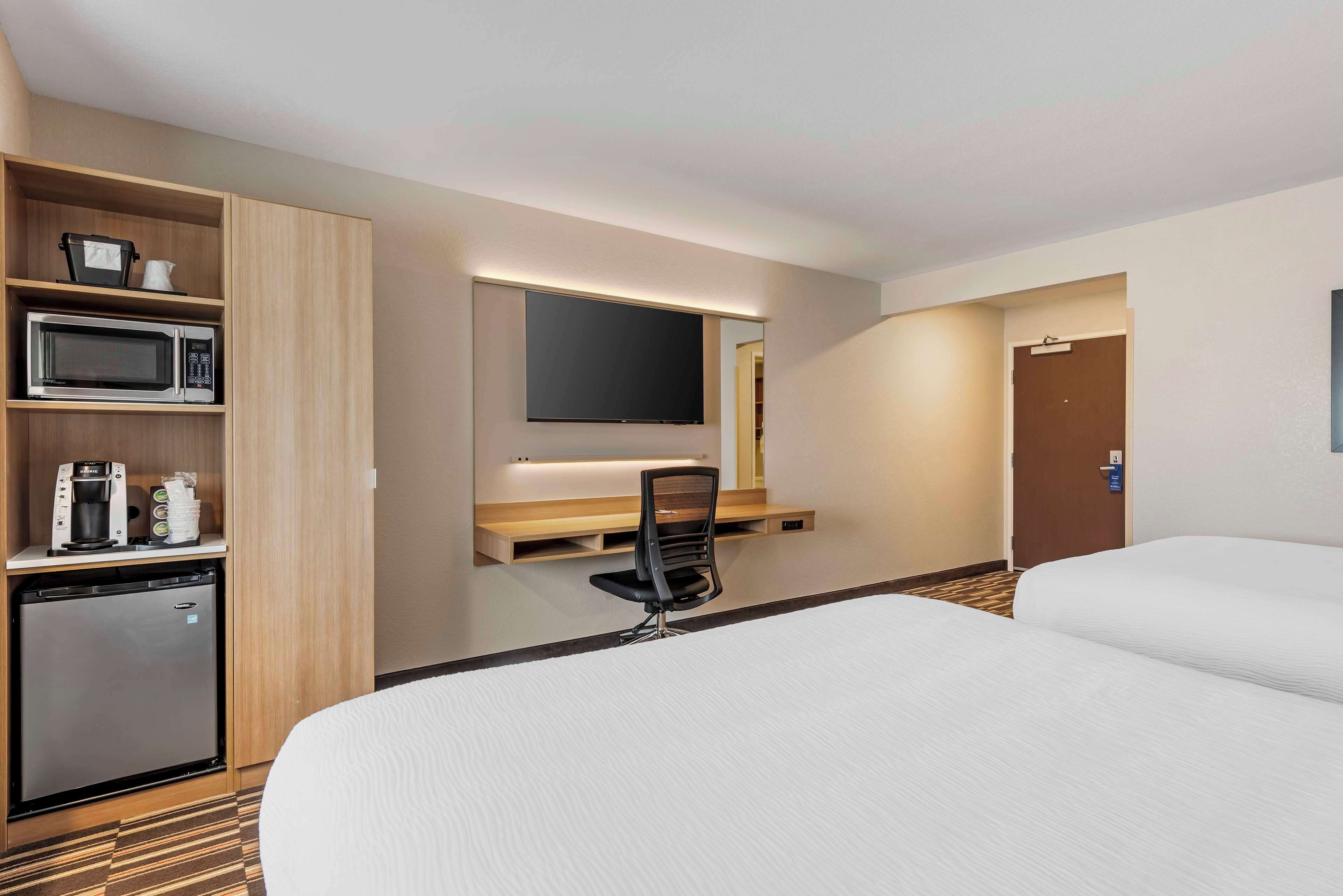 desk, laptop workspace, iron/ironing board, free cots/infant beds