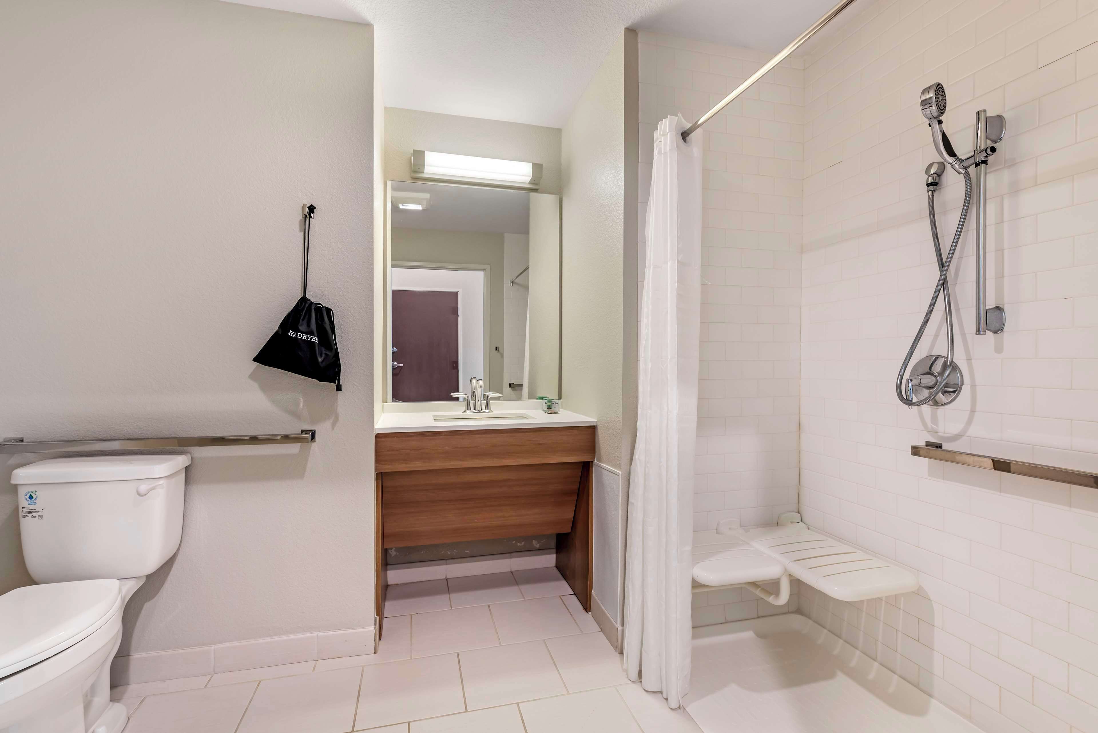 standard room, 1 queen bed, accessible, non smoking (with single sofabed) | bathroom | hair dryer, towels