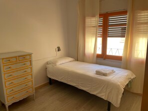 Desk, blackout curtains, free WiFi, bed sheets