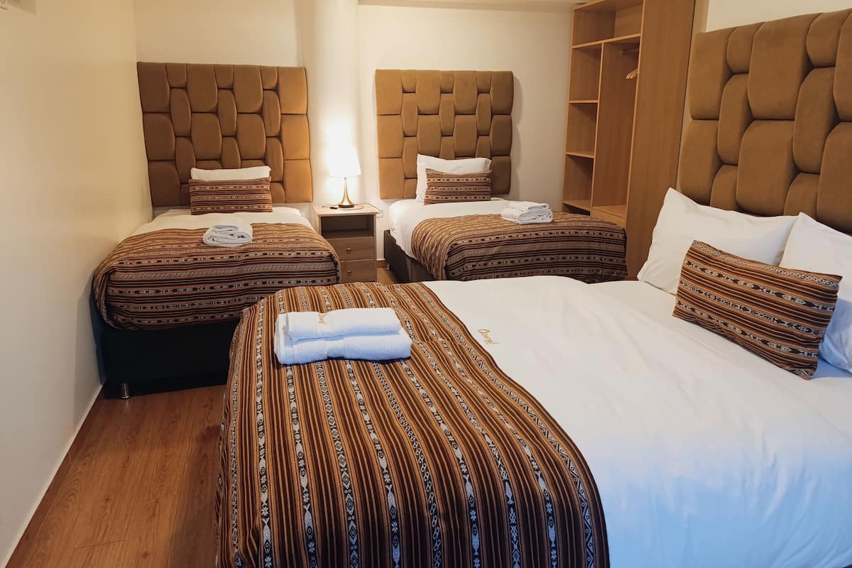 20 bedrooms, down duvets, memory-foam beds, in-room safe