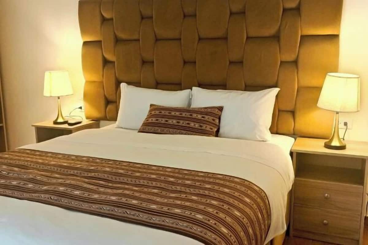 20 bedrooms, down duvets, memory-foam beds, in-room safe