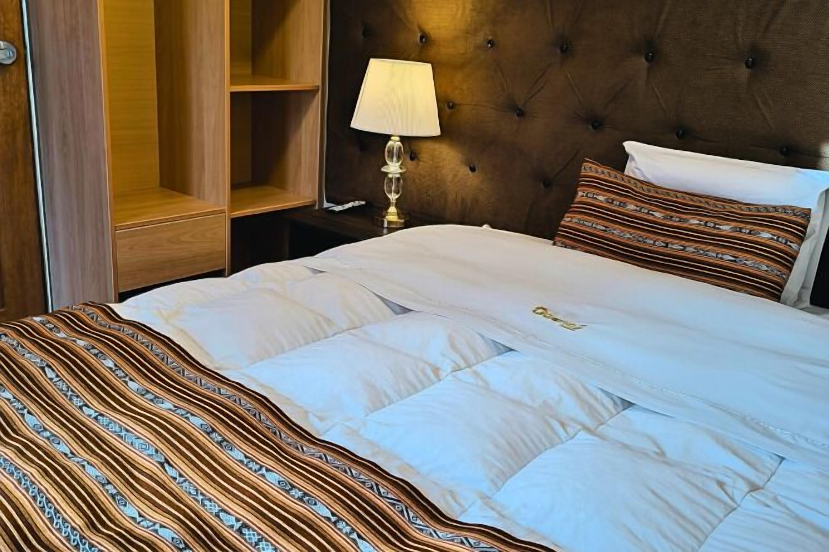 20 bedrooms, down duvets, memory-foam beds, in-room safe