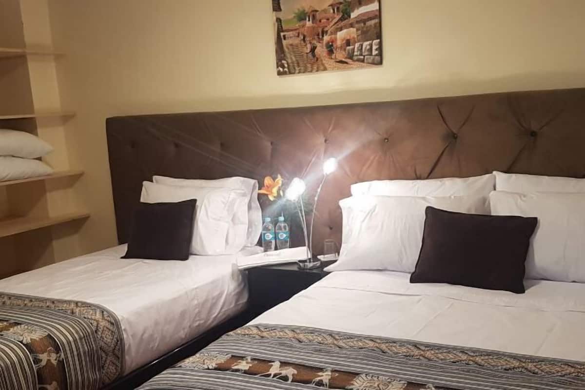 20 bedrooms, down duvets, memory-foam beds, in-room safe