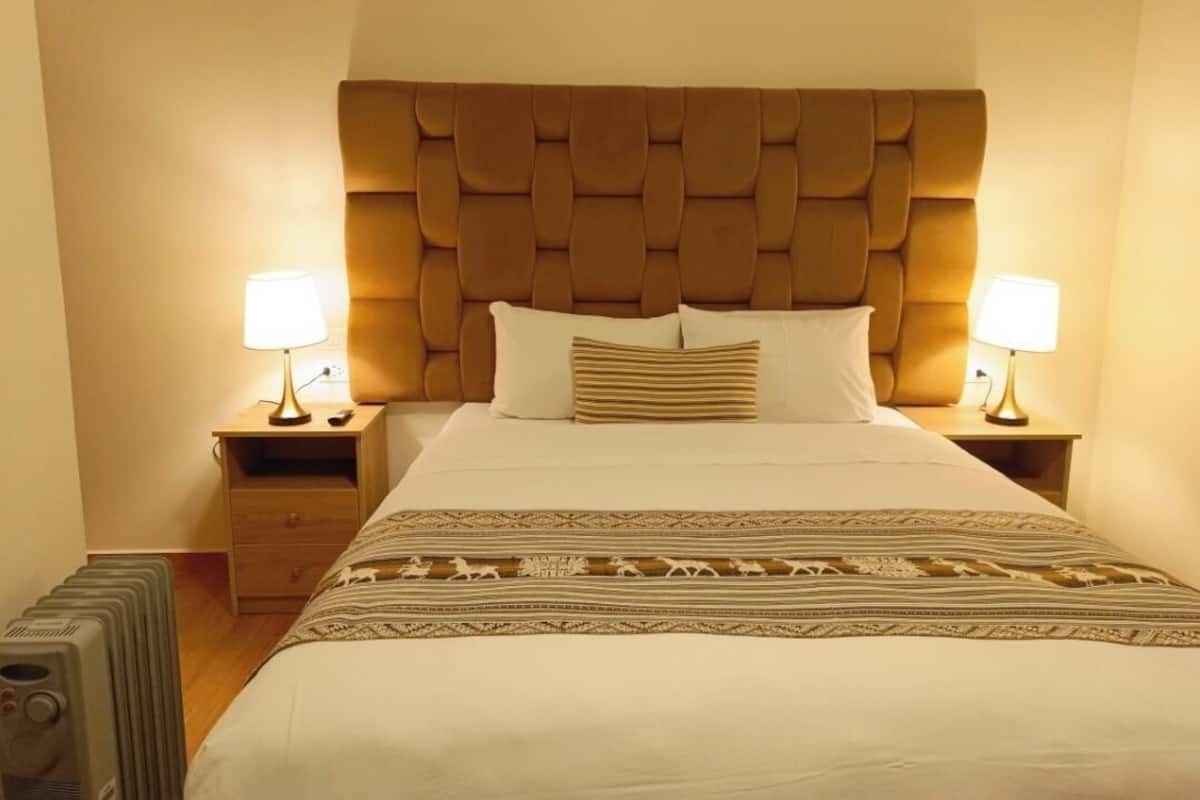 20 bedrooms, down duvets, memory-foam beds, in-room safe
