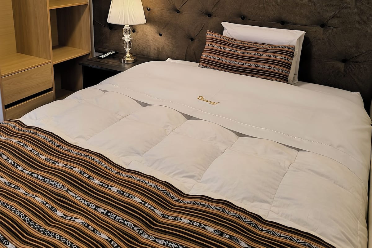 20 bedrooms, down duvets, memory-foam beds, in-room safe