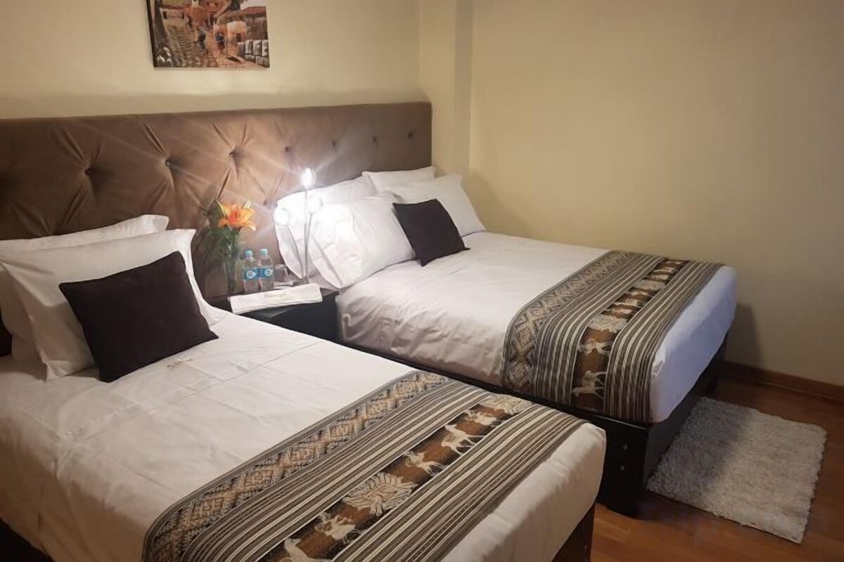 20 bedrooms, down comforters, memory foam beds, in-room safe