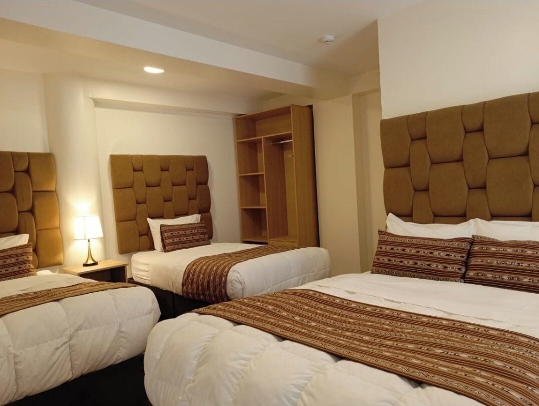 Family Triple Room, Multiple Beds, Private Bathroom | 20 bedrooms, down comforters, memory foam beds, in-room safe