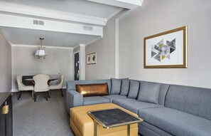 Suite, 1 King Bed (Lexingtonian Suite) | Living area | Flat-screen TV