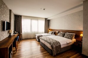 Superior Triple Room, 1 Bedroom, Garden View | Minibar, in-room safe, desk, blackout drapes - Life Point Hotel (Trabzon)