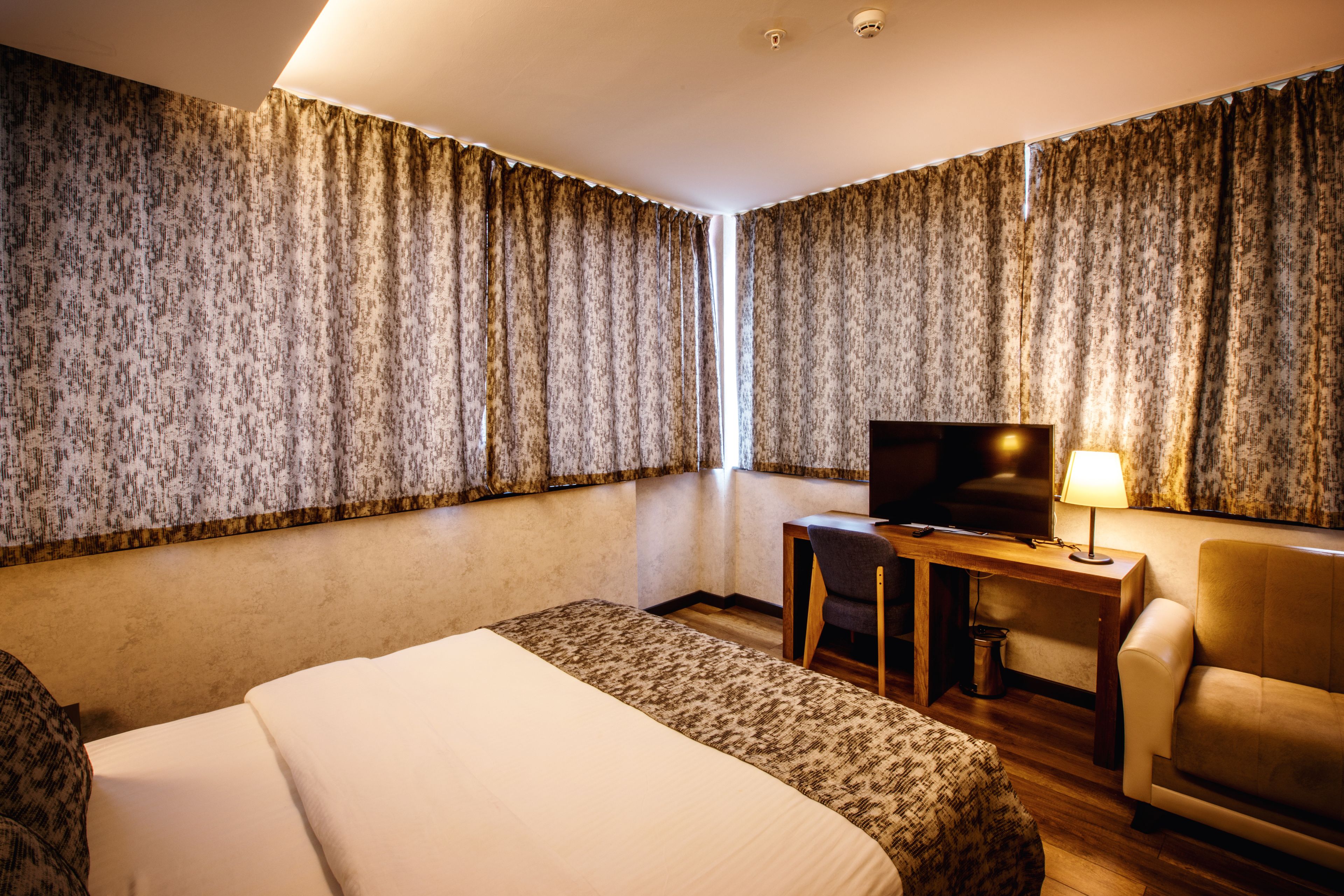 suite, 2 bedrooms, sea view | minibar, in-room safe, desk, blackout curtains
