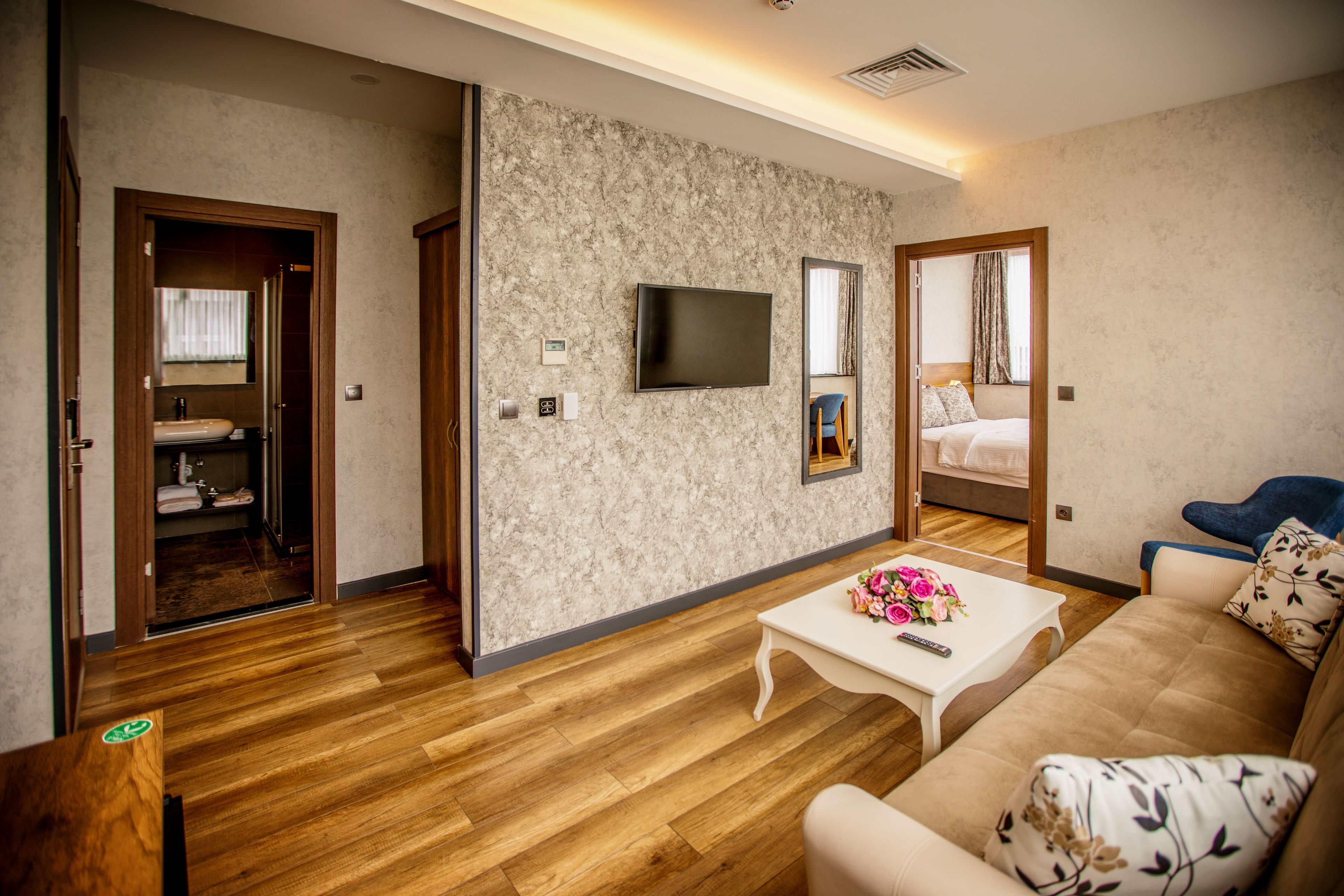suite, 2 bedrooms, sea view | living room | lcd tv