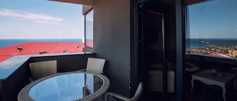 Deluxe Suite, 2 Bedrooms, Balcony, Sea View | Minibar, in-room safe, desk, blackout drapes