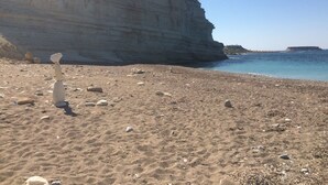 A beach with a large cliff and calm sea. - Villa Talassa near Coral Bay with optional 4x4 CAR, Jacuzzi and HEATED POOL (Paphos)