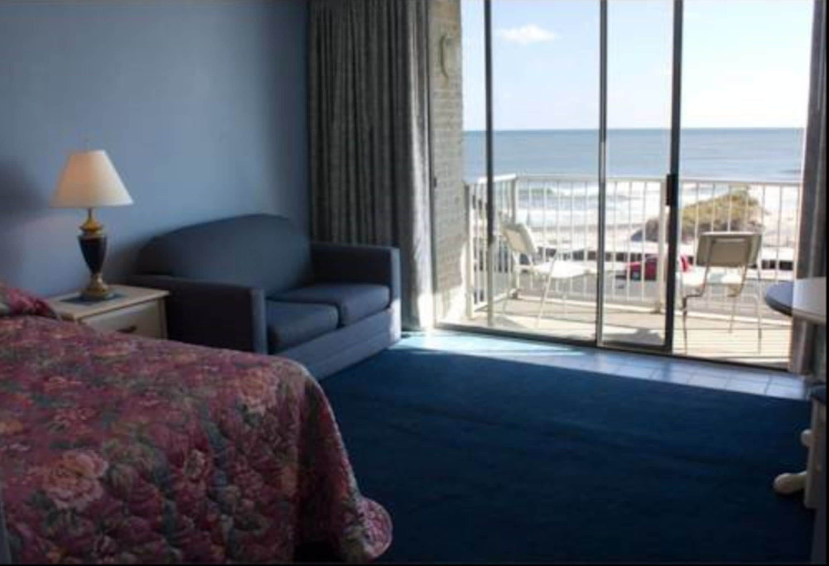 Suíte, vista para o oceano | Ferros/tábuas de passar roupa, roupa de cama