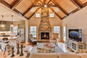 Smart TV, fireplace, table football, books