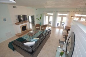 TV, fireplace, books, offices