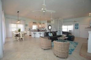 TV, fireplace, books, offices - Oceanfront 4-Bed Home in Palm Coast (Palm Coast)