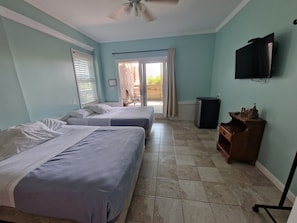 Rum - 2 queensize-sängar - vid stranden | Sängkläder