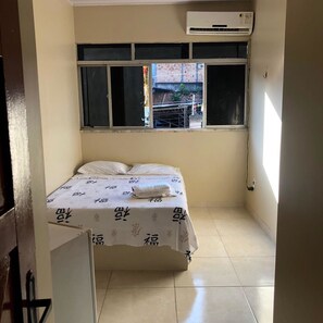 Economy Double Room, 1 Queen Bed, Non Smoking | Minibar, desk, iron/ironing board, free WiFi