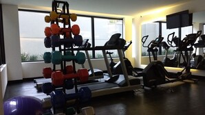 A gym with various exercise equipment, including dumbbells, treadmills, and ellipticals. - VN Bela Cintra (Sao Paulo)