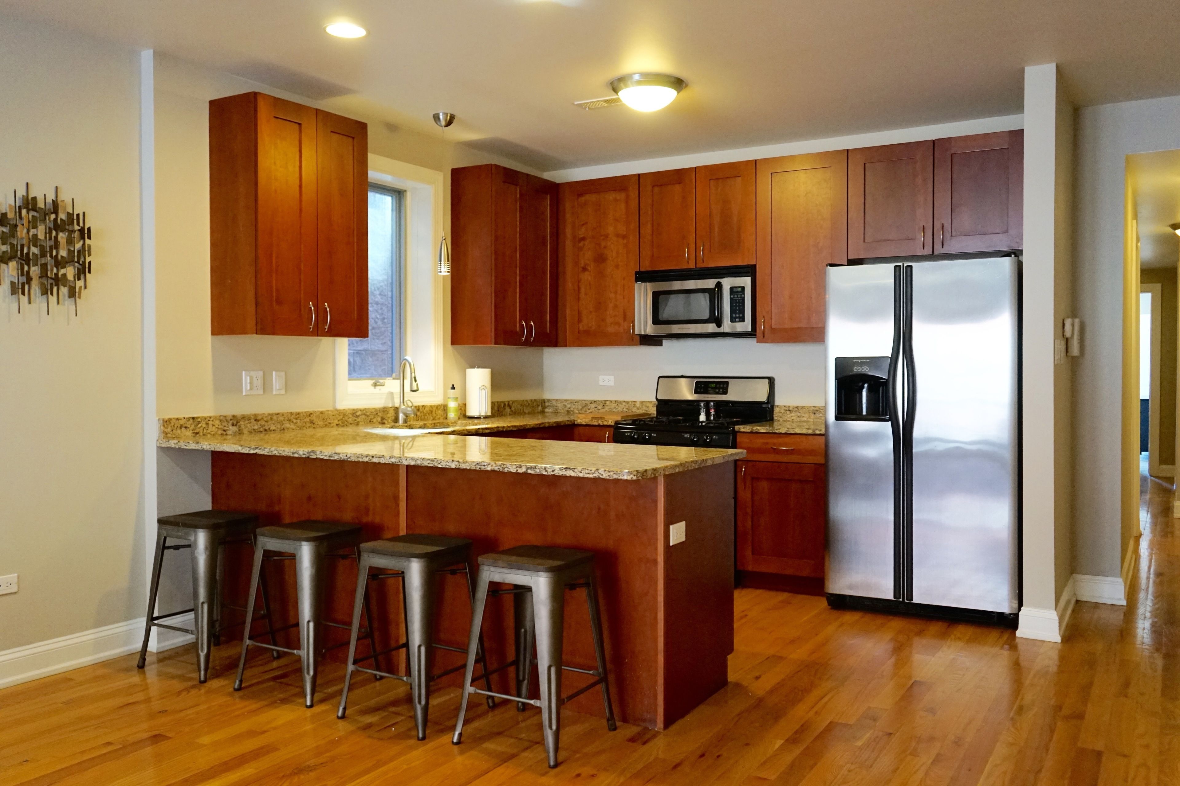 Business Apartment, Balcony, City View | Private kitchen | Fridge, microwave, oven, stovetop