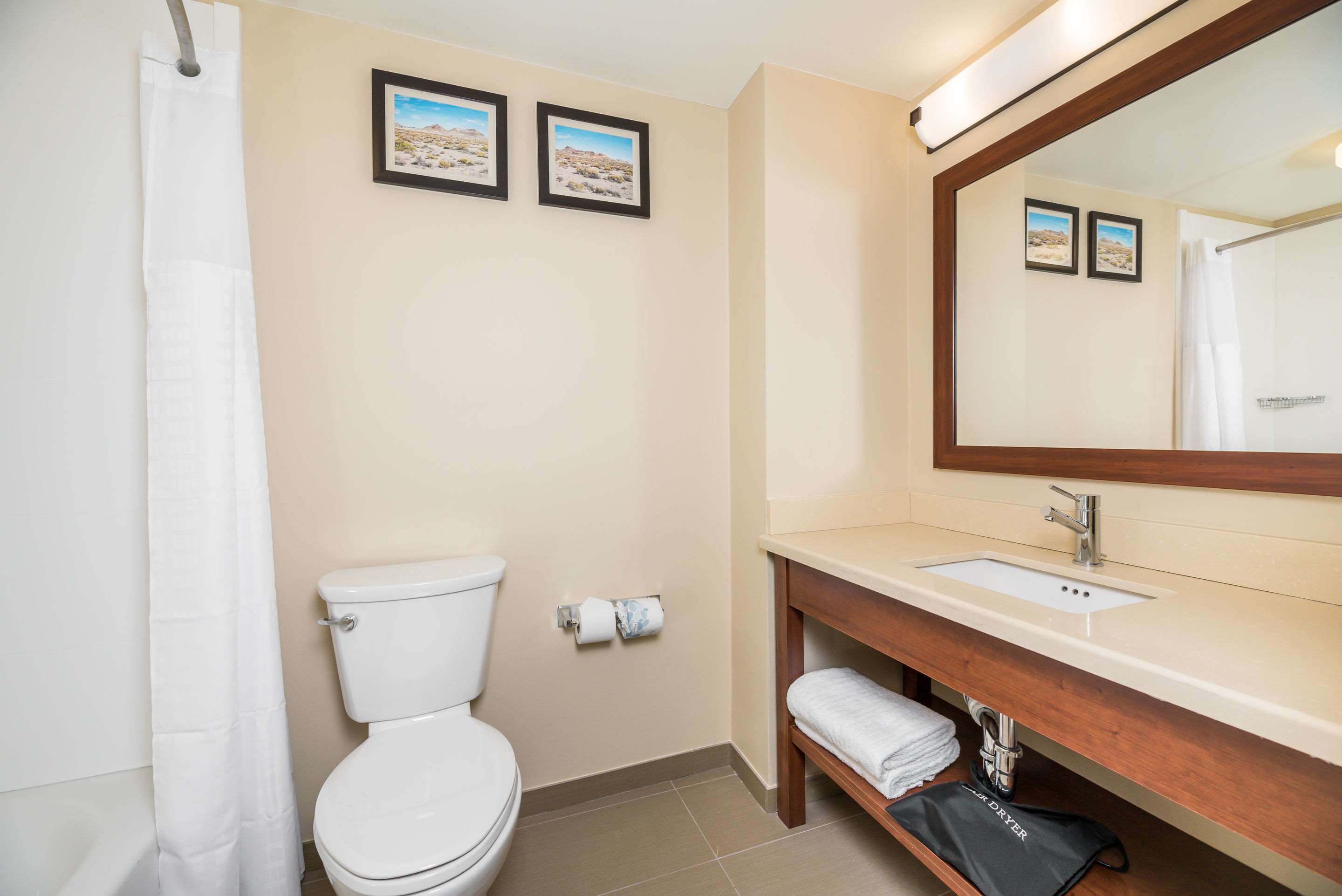 standard room, 2 queen beds, non smoking | bathroom | combined shower/bathtub, free toiletries, hair dryer, towels