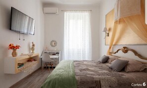 2 quartos, escrivaninha, ferros/tábuas de passar roupa