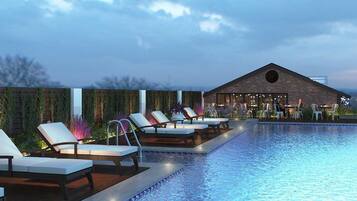 Outdoor pool, pool umbrellas, sun loungers