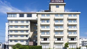 A multi-story hotel with a sign indicating it is a "Station Hotel". - Hikone Station Hotel (Hikone)