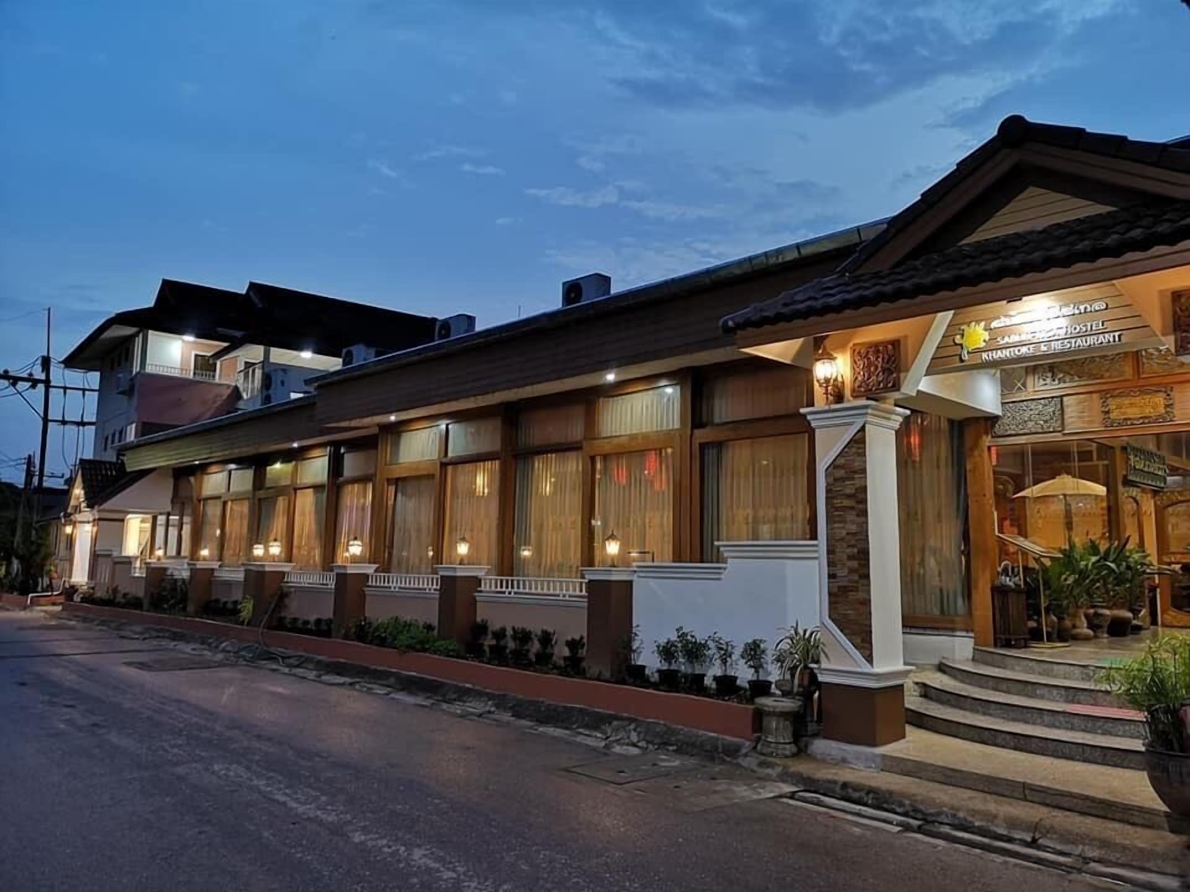 A two-story building with a restaurant on the ground floor.