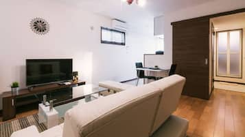 Standard Apartment, Non Smoking | Living room | Flat-screen TV, DVD player
